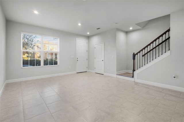 entrance foyer with light tile patterned floors