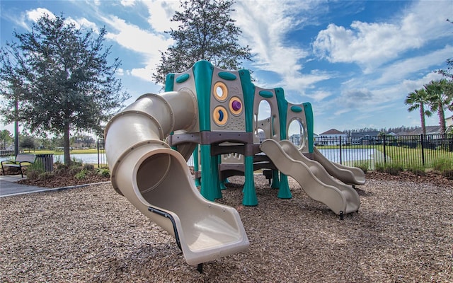 view of playground featuring a water view