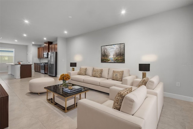 living room with light tile patterned flooring