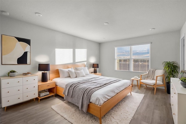 bedroom featuring hardwood / wood-style floors