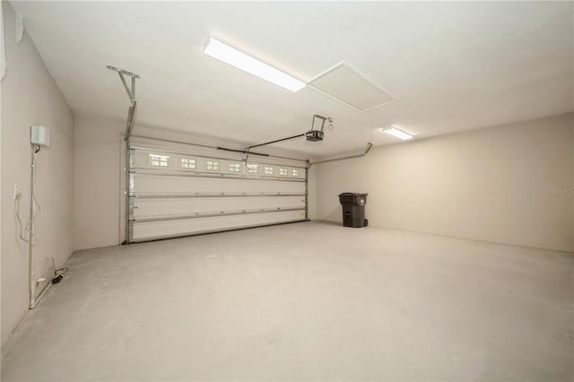 garage featuring a garage door opener