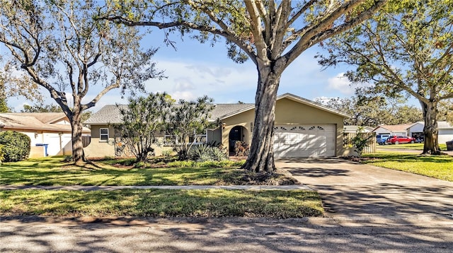 single story home with a front yard and a garage