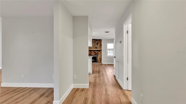 corridor featuring light wood-type flooring