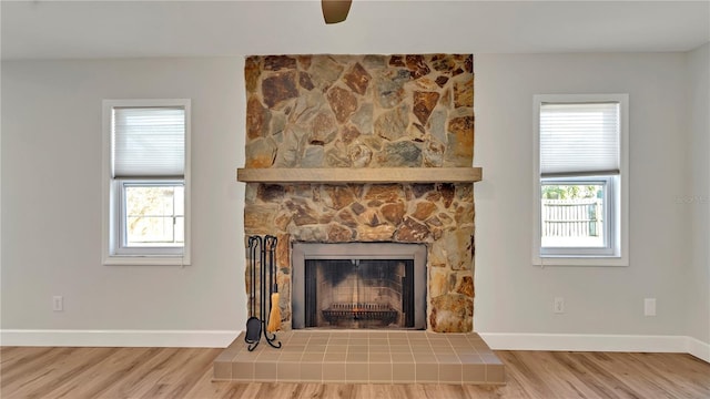 interior details featuring hardwood / wood-style flooring and ceiling fan