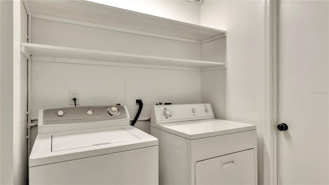 laundry room featuring independent washer and dryer