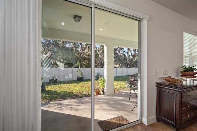 doorway to outside featuring light wood-type flooring