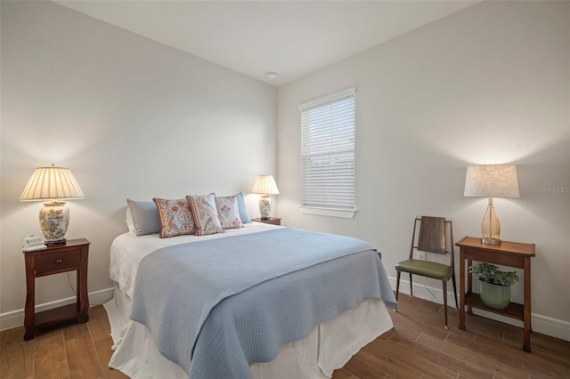 bedroom featuring hardwood / wood-style flooring