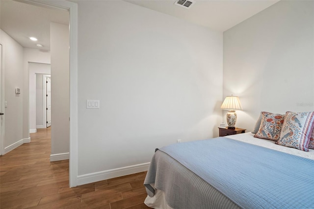 bedroom featuring hardwood / wood-style floors