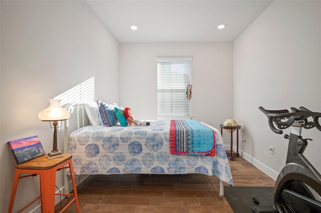 bedroom featuring dark hardwood / wood-style floors