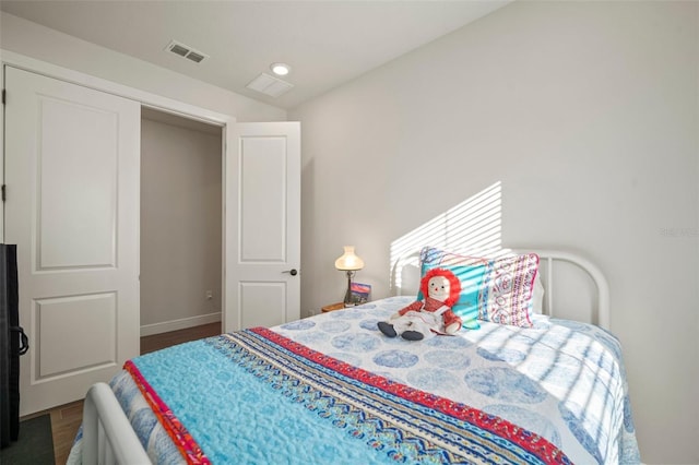 bedroom featuring dark wood-type flooring