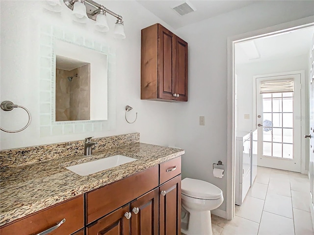 bathroom with walk in shower, tile patterned floors, toilet, and vanity