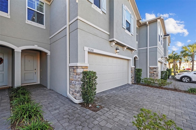 view of property exterior featuring a garage