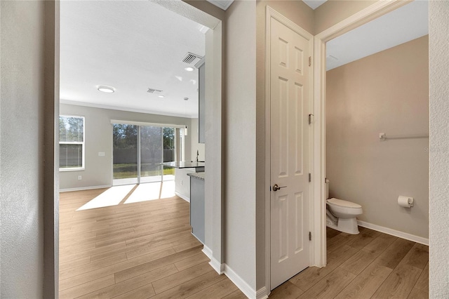 hallway featuring light hardwood / wood-style floors