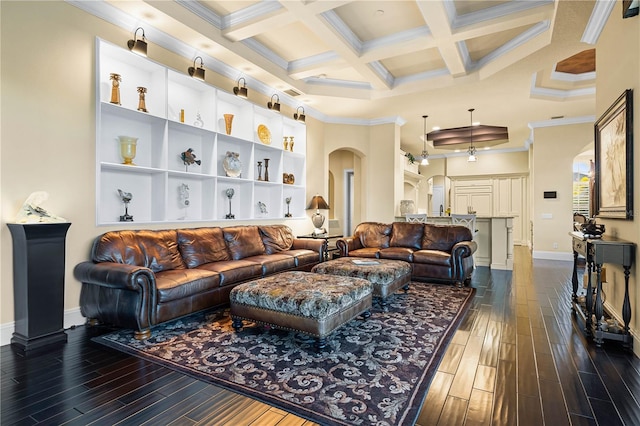 living room featuring crown molding, beamed ceiling, and coffered ceiling