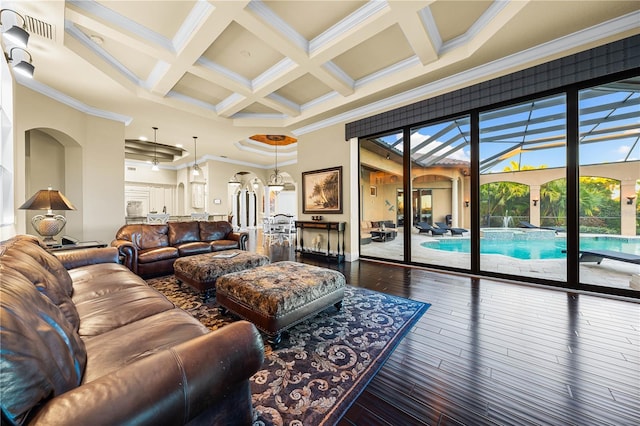 living room with wood-type flooring, crown molding, beam ceiling, and coffered ceiling