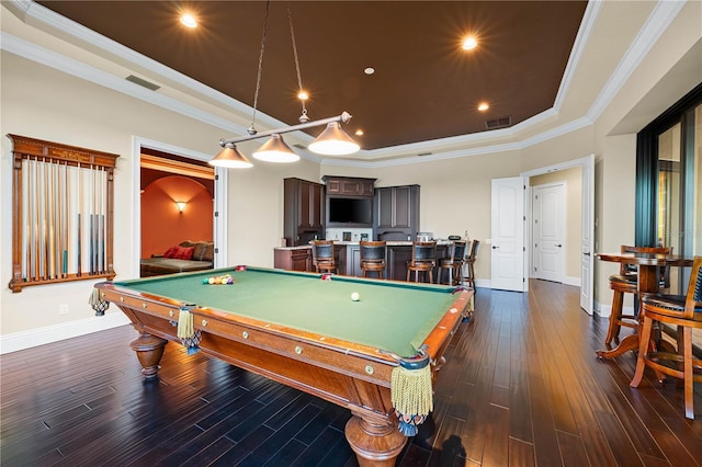 playroom featuring ornamental molding, dark hardwood / wood-style floors, a tray ceiling, and billiards