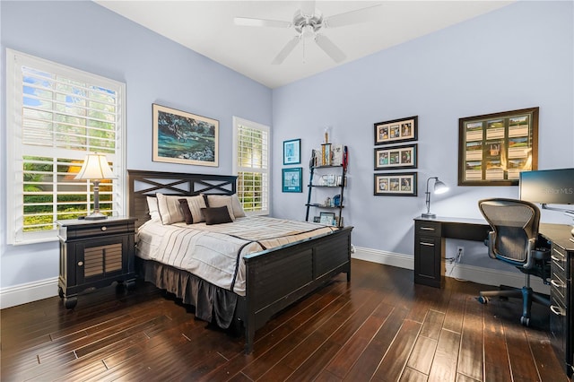 bedroom featuring ceiling fan and dark hardwood / wood-style floors