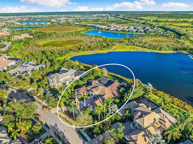 drone / aerial view with a water view