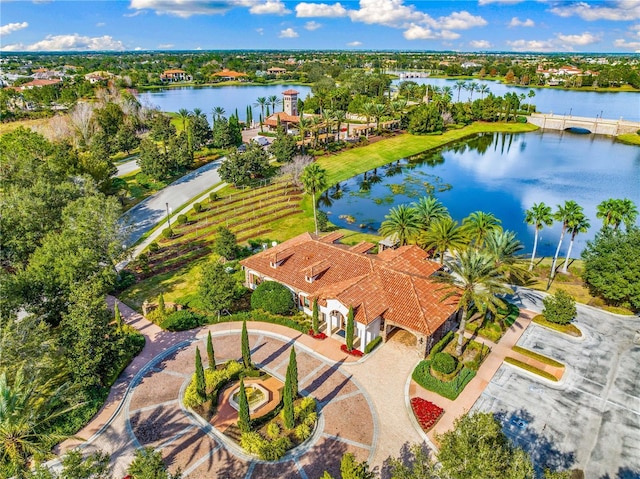 birds eye view of property featuring a water view