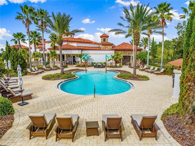 view of pool with a patio