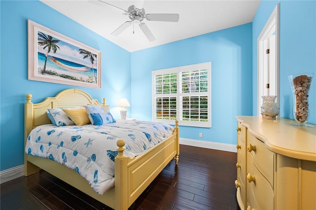 bedroom featuring ceiling fan and dark hardwood / wood-style floors