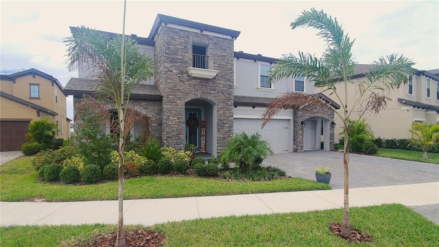 view of front of home with a garage