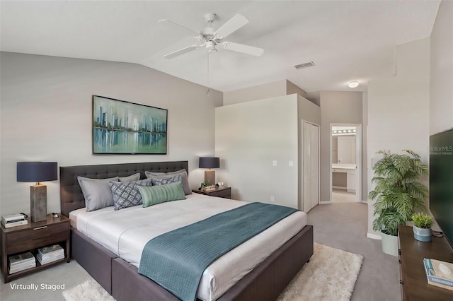 carpeted bedroom featuring ensuite bathroom, ceiling fan, and lofted ceiling