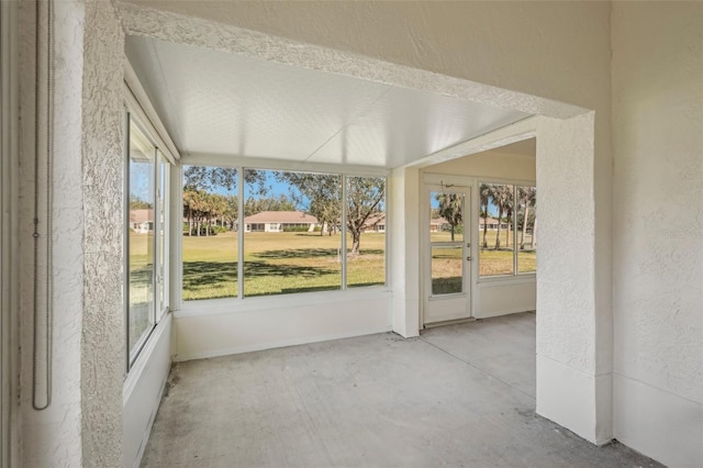 unfurnished sunroom with a healthy amount of sunlight