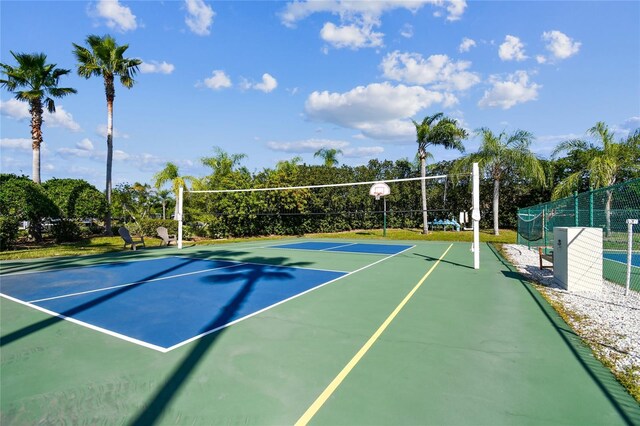 view of tennis court featuring basketball court