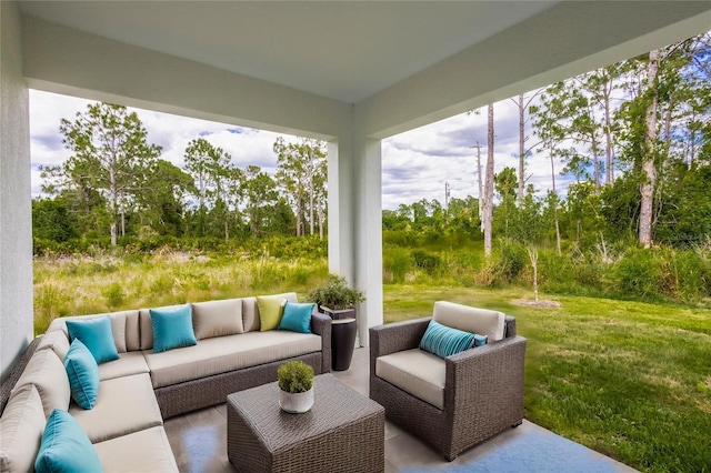 3430 Sarto Ln, Rotonda West, FL 33947 - view of patio / terrace featuring an outdoor hangout area and view of wooded area