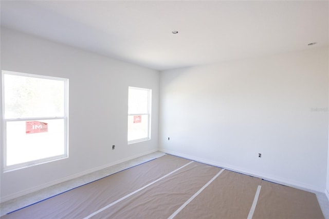 3430 Sarto Ln, Rotonda West, FL 33947 - empty room featuring baseboards and carpet
