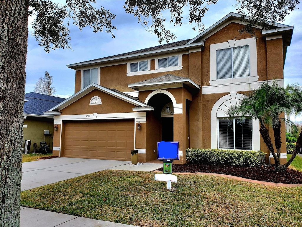 view of front of property with a front lawn