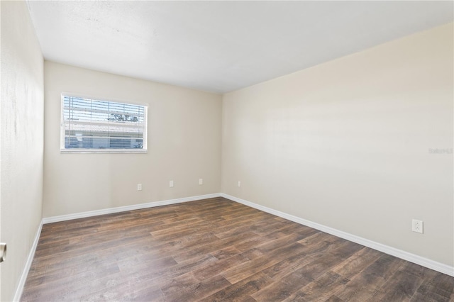 9201 40th Way N, Pinellas Park, FL 33782 - unfurnished room featuring dark wood finished floors
