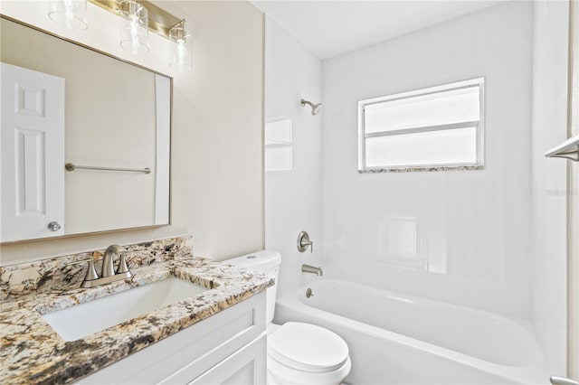 full bathroom featuring vanity, toilet, and tiled shower / bath combo