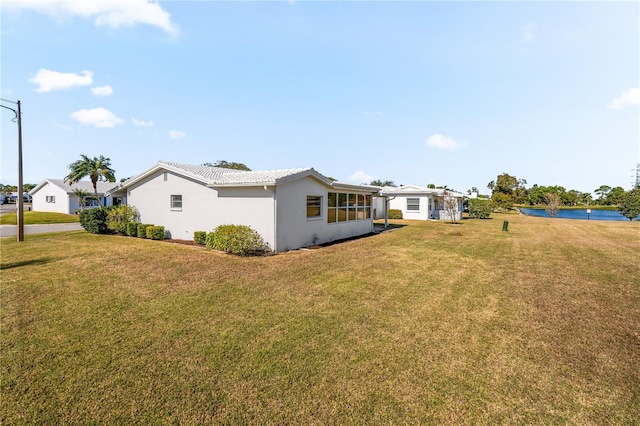 9201 40th Way N, Pinellas Park, FL 33782 - view of grassy yard featuring a water view