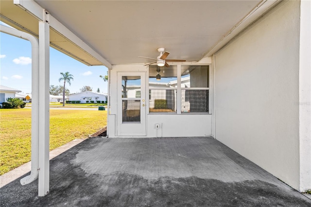 view of patio featuring ceiling fan