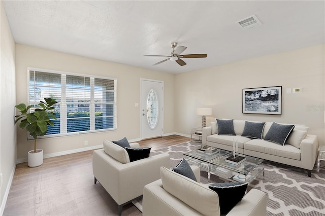 9201 40th Way N, Pinellas Park, FL 33782 - living area with ceiling fan and wood finished floors