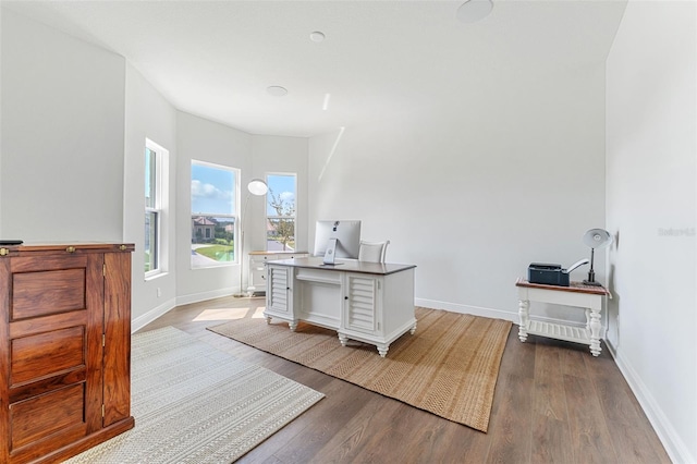 office area with light hardwood / wood-style flooring