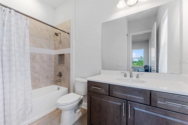 full bathroom with shower / bath combination with curtain, vanity, and toilet