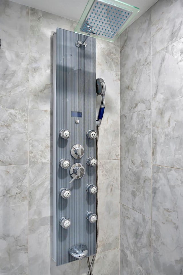 exterior details featuring walk in shower