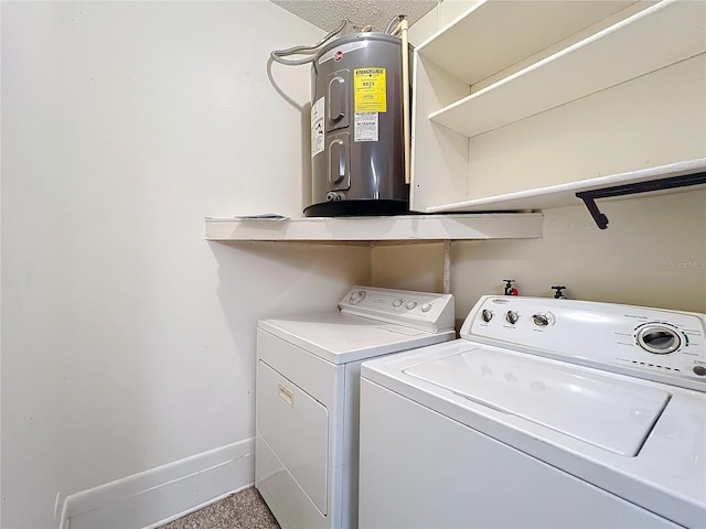 laundry room with independent washer and dryer and water heater