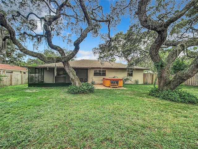 1237 N Lion Cub Pt, Lecanto, FL 34461 - back of property featuring a jacuzzi, a sunroom, and stucco siding
