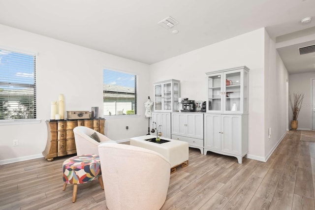 sitting room featuring light wood-type flooring