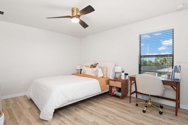 bedroom featuring light hardwood / wood-style floors and ceiling fan