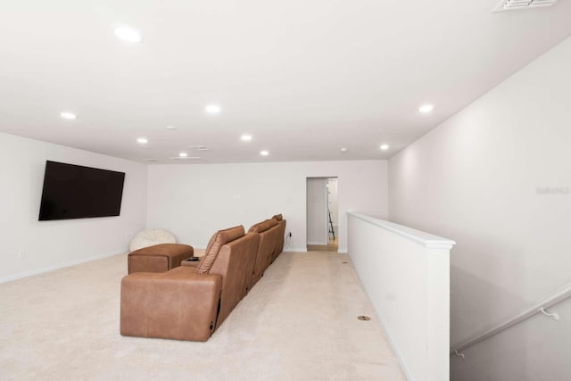 cinema room with light carpet