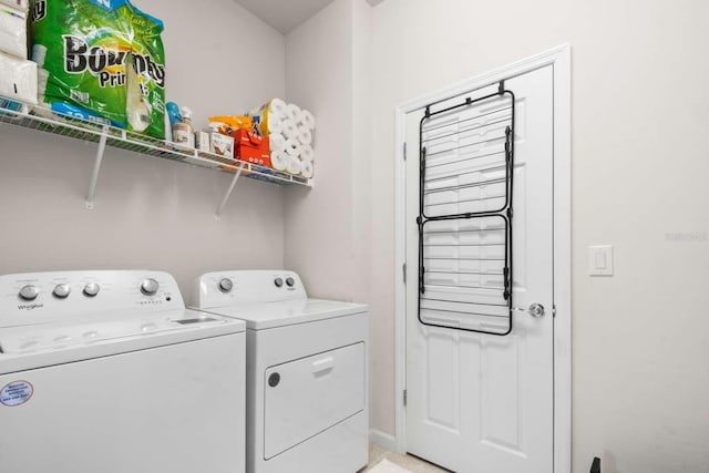 washroom featuring independent washer and dryer