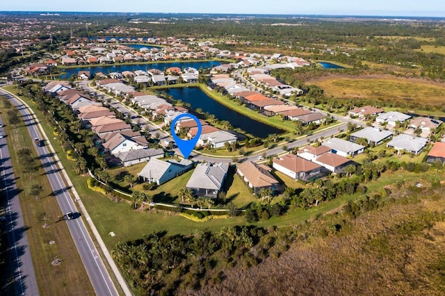 drone / aerial view with a water view