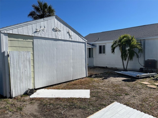 view of outdoor structure with central AC