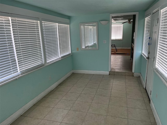 interior space featuring a wealth of natural light and ceiling fan