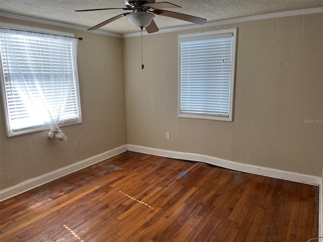 unfurnished room with a textured ceiling, hardwood / wood-style flooring, ceiling fan, and ornamental molding